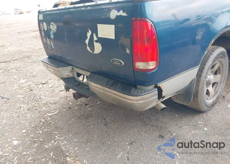 1999 Ford F-150 Lariat/Xl/Xlt z USA, uszkodzony, nr VIN 1FTRX17L0XNC07560